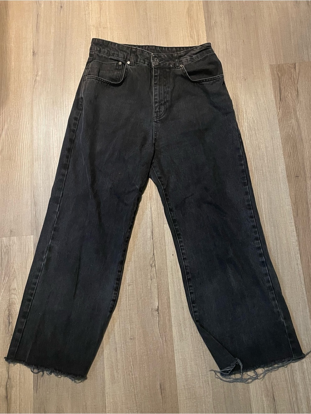Bagged black relaxed straight leg jeans
